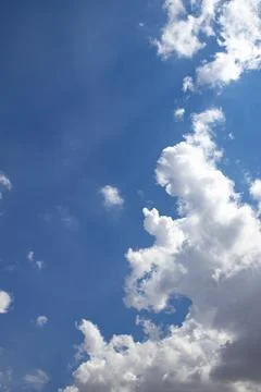 Blue sky with dramatic cumulus cloud Stock Photos