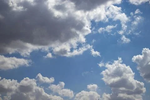 Blue sky with dramatic cumulus cloud Stock Photos