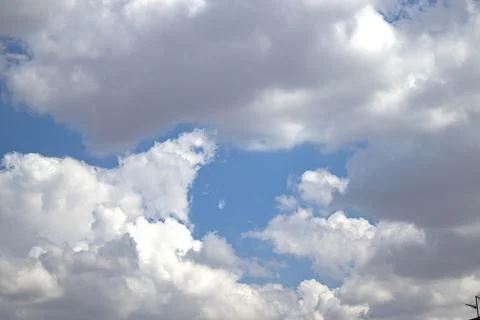 Blue sky with dramatic cumulus cloud Stock Photos