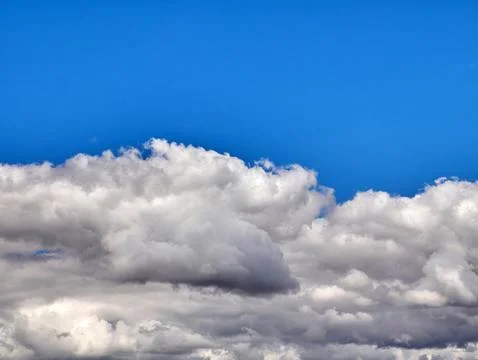 Blue Sky With Dramatic White Clouds Stock Photos
