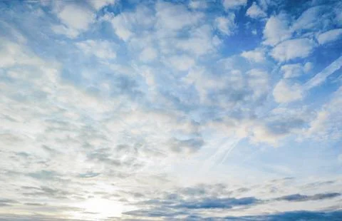 Blue sky with dramatic white clouds natural cloudscape background Stock Photos