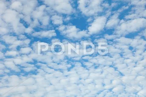 Blue sky with easy clouds Stock Photos