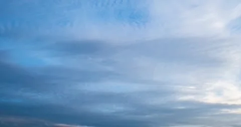 Blue sky with fast moving white cumulus and cirrus clouds timelapse background Stock Footage 344102641