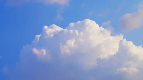 Blue sky features fluffy white cumulus clouds Timelapse Nature, Timelapse sky Stock Footage 328581241