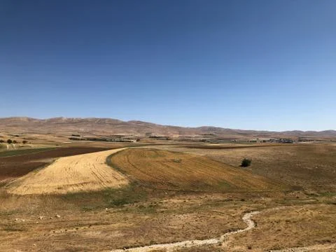 Blue Sky with Fields, Mountains Foto stock