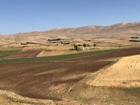 Blue Sky with Fields, Mountains Foto stock
