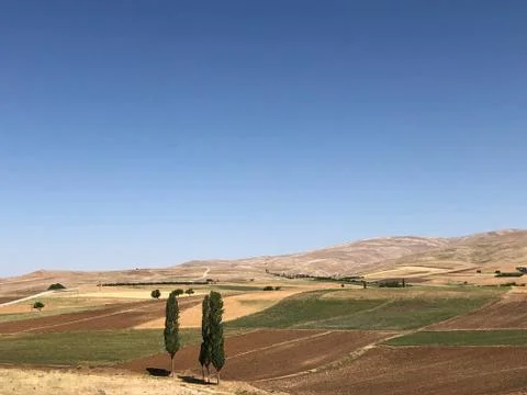 Blue Sky with Fields, Mountains Foto stock