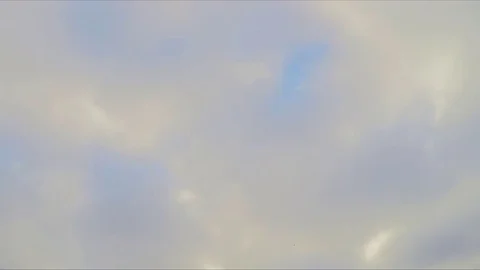 Blue sky with floating clouds and sun timelapse 스톡 동영상 82987375