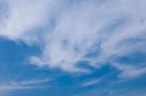 Blue sky with fluffy cloud. Stock Photos