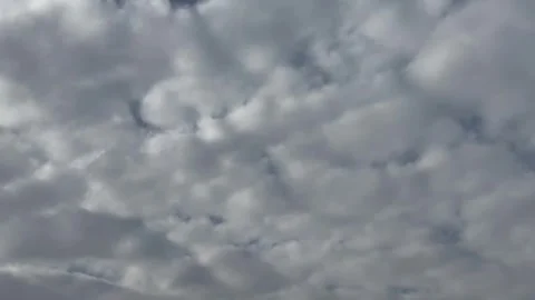 Blue Sky with Fluffy Clouds Background 動画素材 331458966