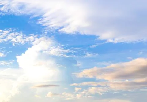 Blue sky with fluffy clouds Stock Photos