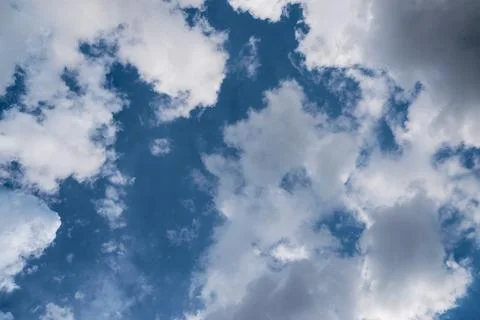 Blue Sky with Fluffy Clouds Stock Photos