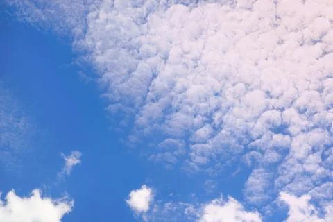 Blue sky, fluffy white cloud Stock Photos