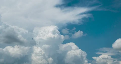 Blue sky fluffy white clouds on summer season bright clear skyline with beautifu Stock Footage 154618238