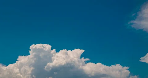 Blue sky fluffy white clouds on summer season bright clear skyline with beautifu Stock Footage 154618241