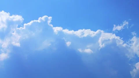 Blue sky with fluffy white clouds on a bright sunny day Time Lapse, Timelapse Stock Footage 328827340