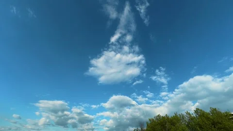 Blue sky with fluffy white clouds. Balkan, Eastern Europe, POV Video stock 333483375