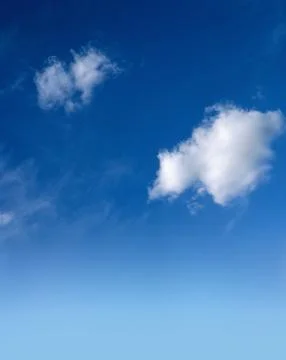 Blue sky with fluffy white clouds Foto stock