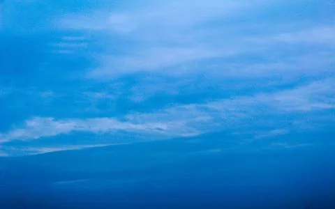 Blue sky with fluffy white clouds white fluffy clouds on blue sky Stock Photos