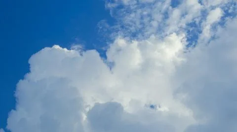 Blue Sky With Fluffy White Clouds 写真素材