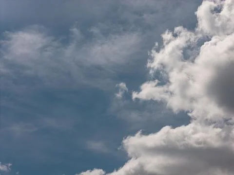 Blue sky with fluffy white clouds background 스톡 사진