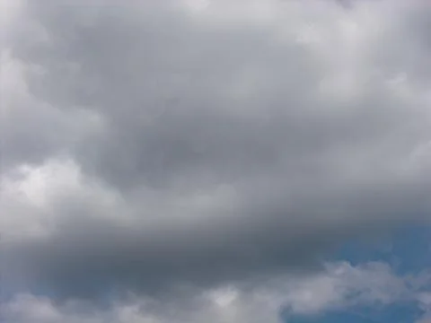Blue sky with fluffy white clouds background Stock-Fotos