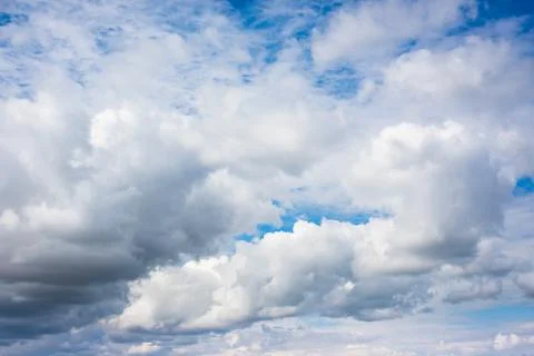 Blue sky full of clouds Stock Photos