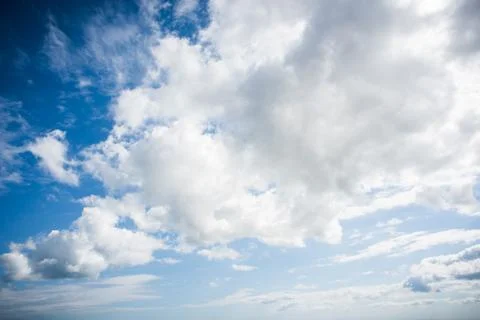 Blue sky full of clouds Stock Photos