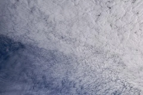 Blue sky full of white clouds, sunny day Stock Photos