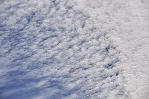 Blue sky full of white clouds, sunny day Stock Photos