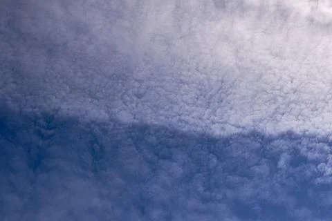 Blue sky full of white clouds, sunny day Stock Photos