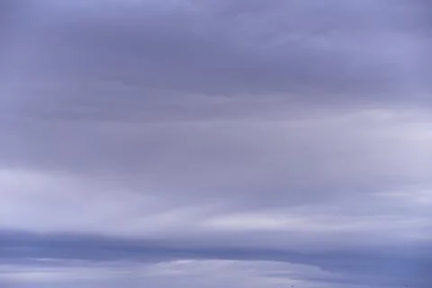 A blue sky full of white clouds, sunny day Stock Photos