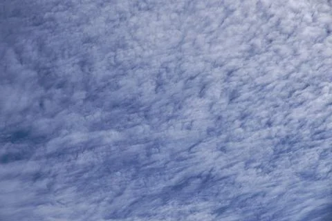 Blue sky full of white clouds, sunny day Stock Photos