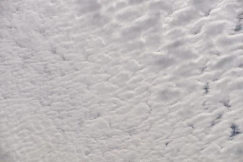 A blue sky full of white clouds, sunny day Stock Photos
