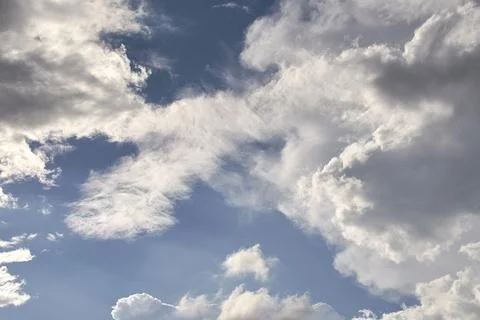 Blue sky full of white clouds, sunny day Stock Photos