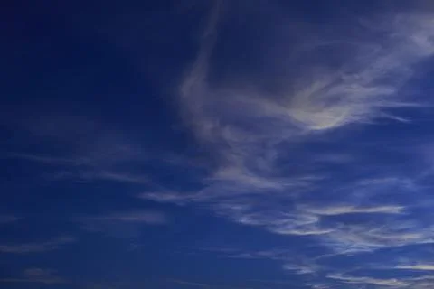 A blue sky full of white clouds Stock Photos