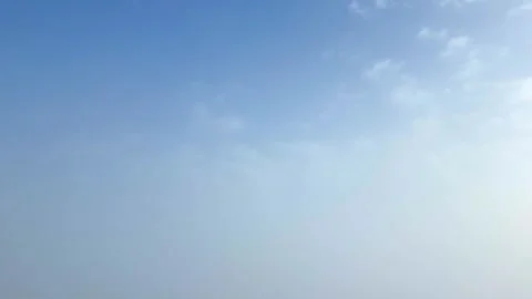 Blue sky gradually turns into white mist as clouds cover the view. Stock Footage 275894268