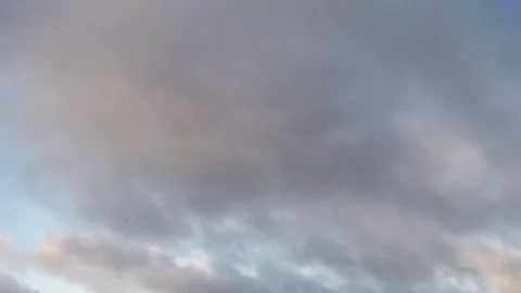 Blue sky with heavy grey clouds timelapse Stock Footage 82987926