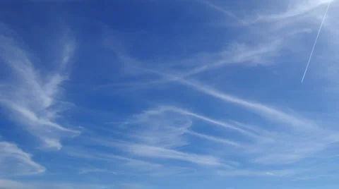 Blue sky with high clouds and vapour trails timelapse Stock Footage 2662877