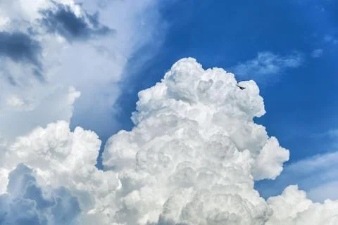 Blue sky with huge clouds. Stock Photos