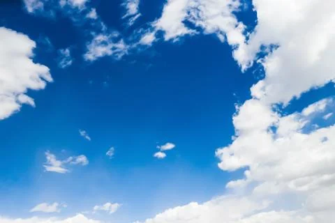 Blue sky with huge clouds Stock Photos