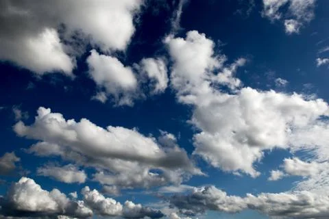 Blue sky with interesting cloudscape. Stock Photos