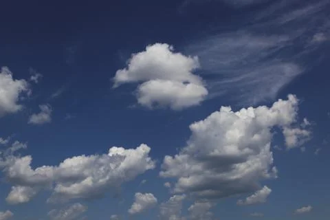 Blue sky with interesting cloudscape. Stock Photos