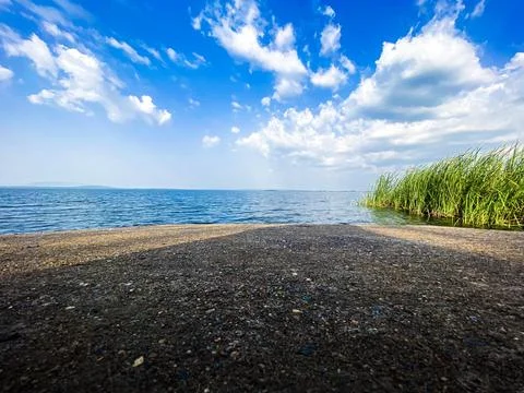 Blue sky at lake side Stock Photos