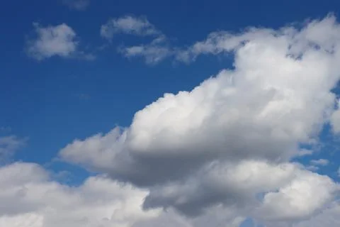 Blue sky with a large white cloud. Stock Photos