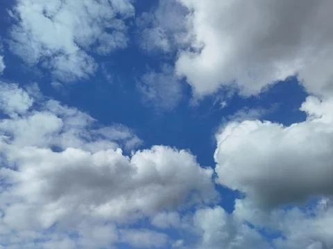 Blue Sky With Large White Clouds Stock Photos