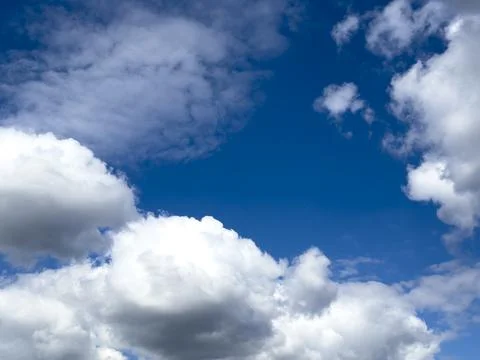 Blue sky with large white clouds. Open cloudscape with daylight and clear Photos