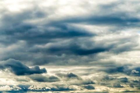 Blue sky with layers of clouds Stock Photos