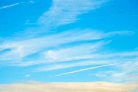 Blue sky with layers of clouds Stock Photos