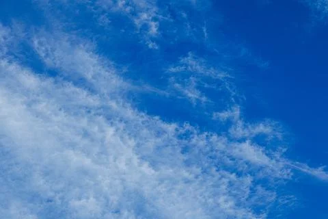 Blue Sky with Light Clouds Stock Photos